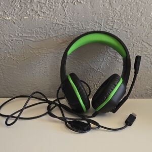 Sleek Black and Green Gaming Headset